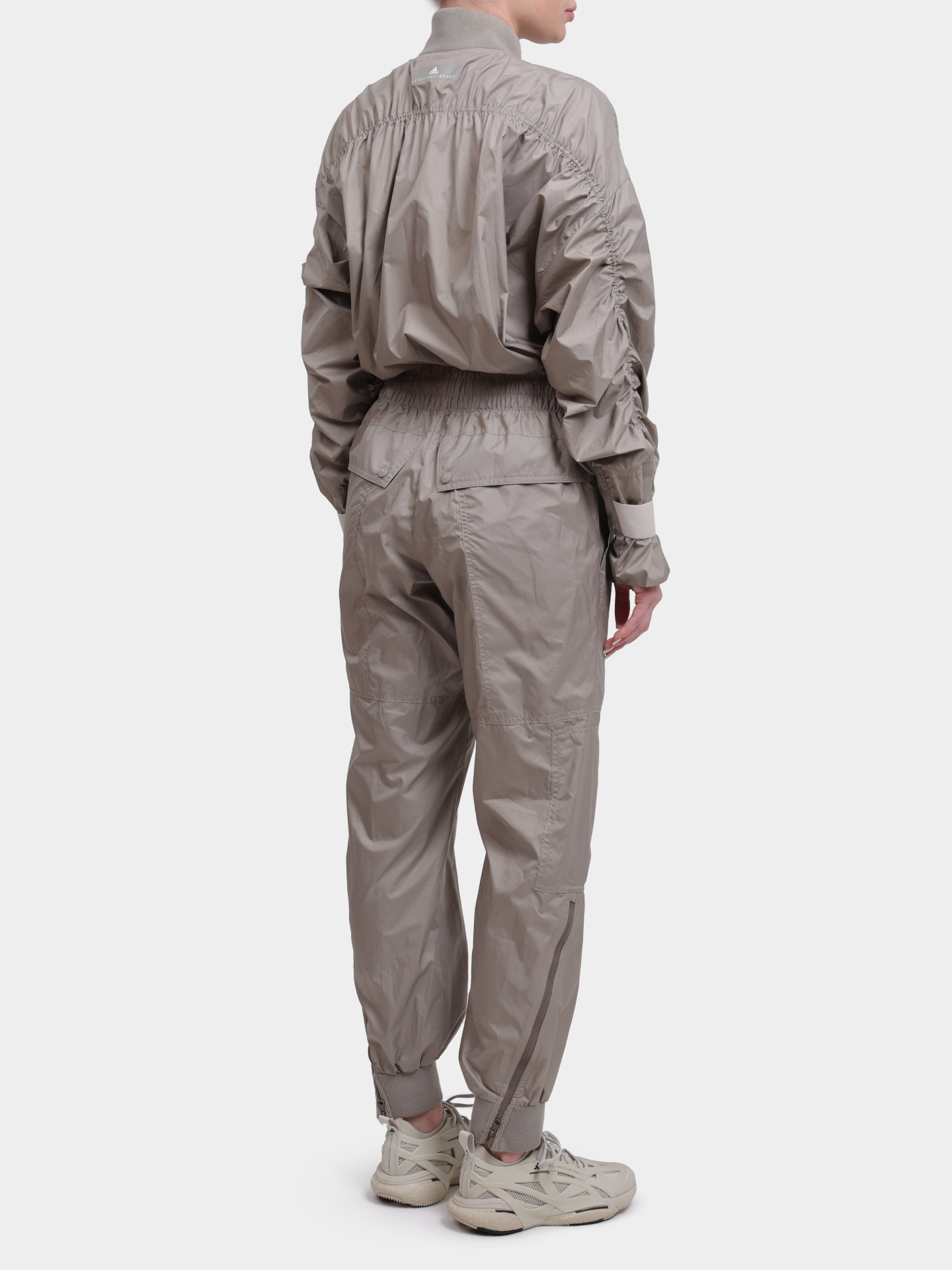 Комбинезон Adidas by Stella McCartney FK8861 бежевый женский — купить в интернет-магазине Verdistore