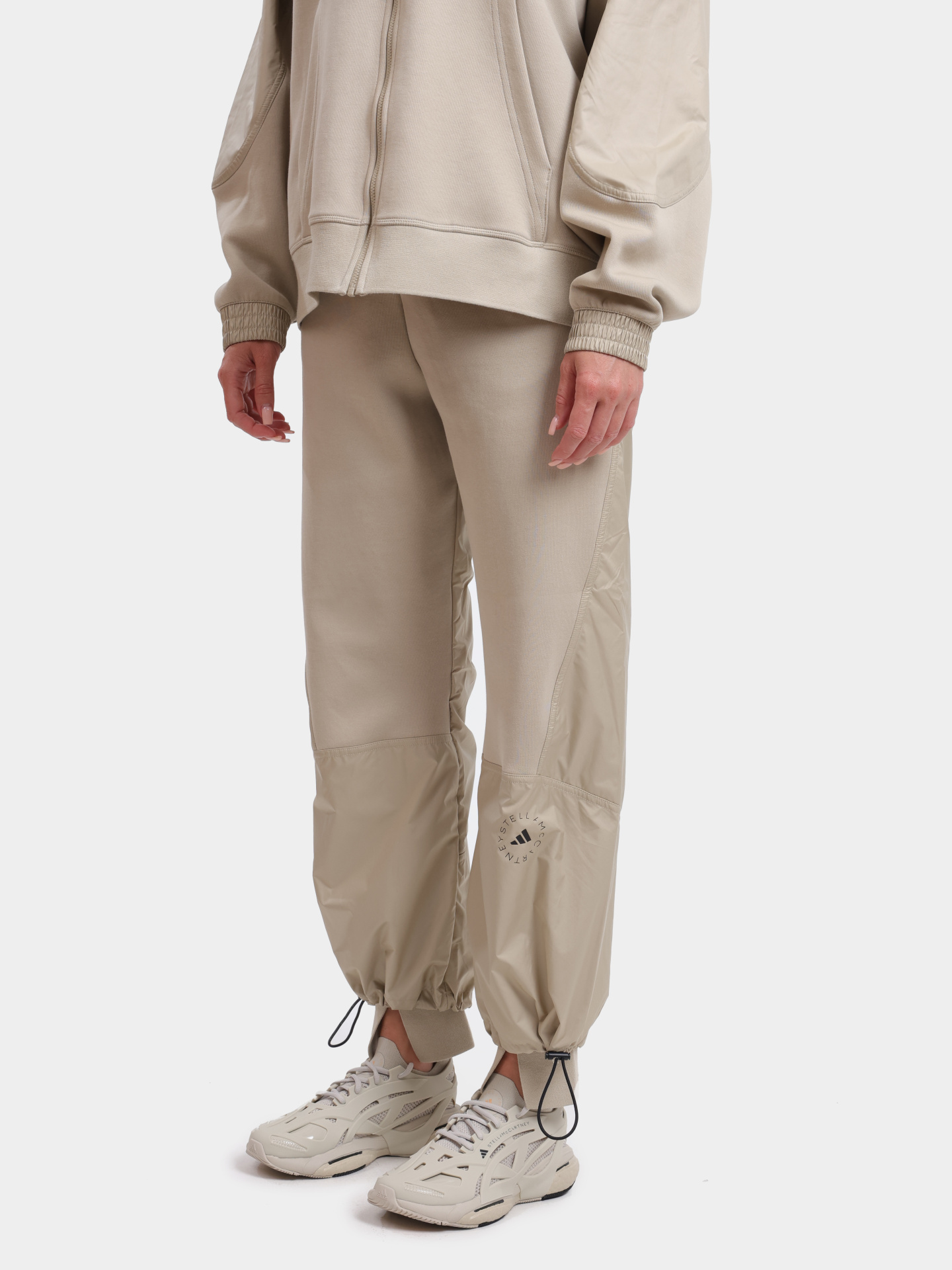 Джоггеры Adidas by Stella McCartney JG5781 DESERTSANDSMC комбинированые женские — купить в интернет-магазине Verdistore