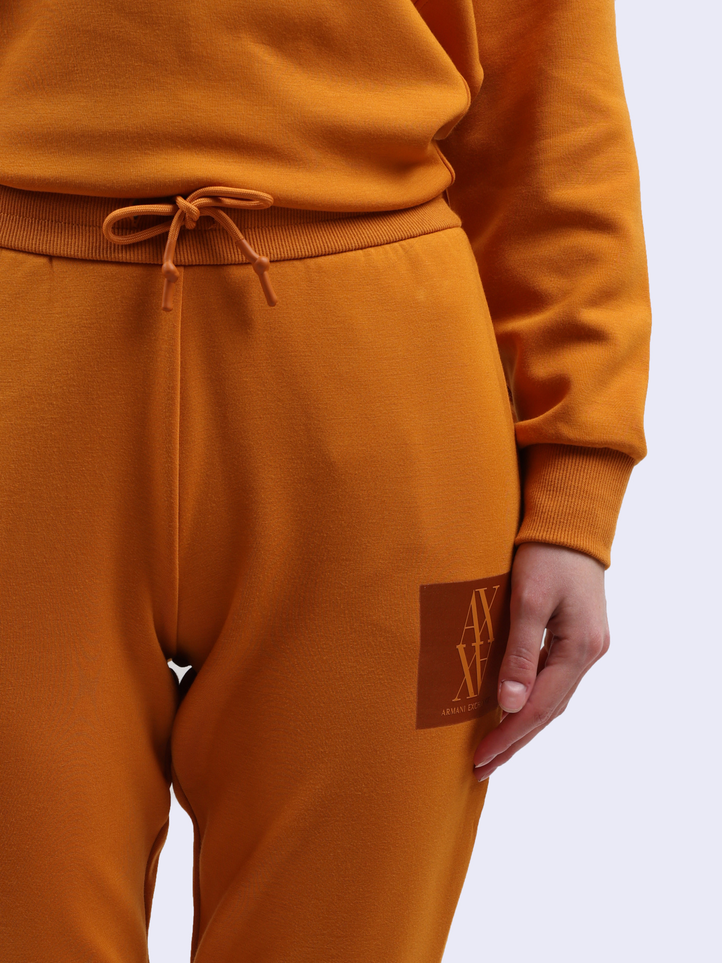 картинка Брюки спортивные Armani Exchange 6DYP79 YJEGZ 1799 оранжевые женские от магазина Verdistore