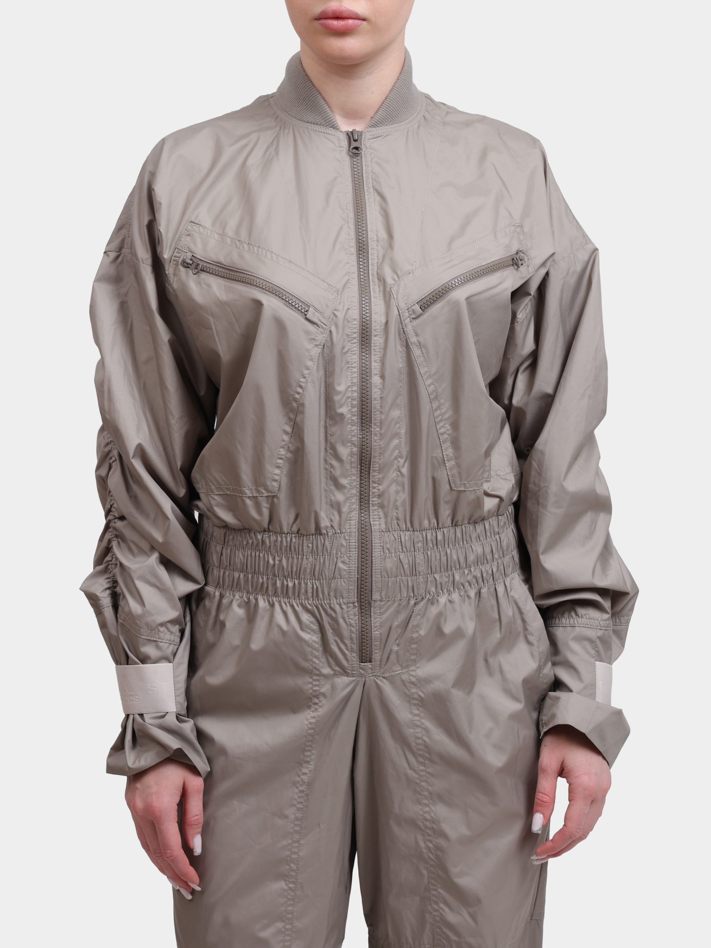 Комбинезон Adidas by Stella McCartney FK8861 бежевый женский — купить в интернет-магазине Verdistore