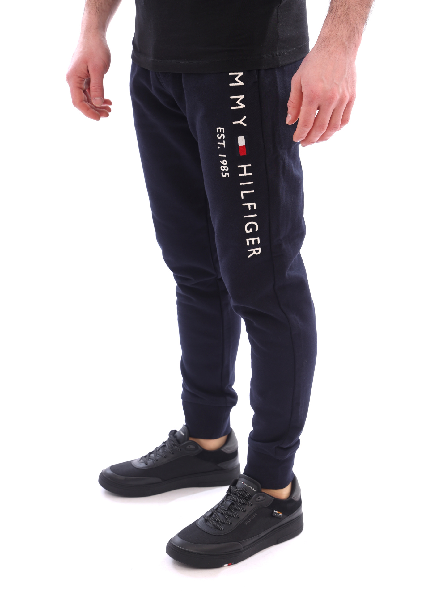 Брюки темно-синие хлопковые зауженного кроя с крупным логотипом сбоку — купить в интернет-магазине Verdistore