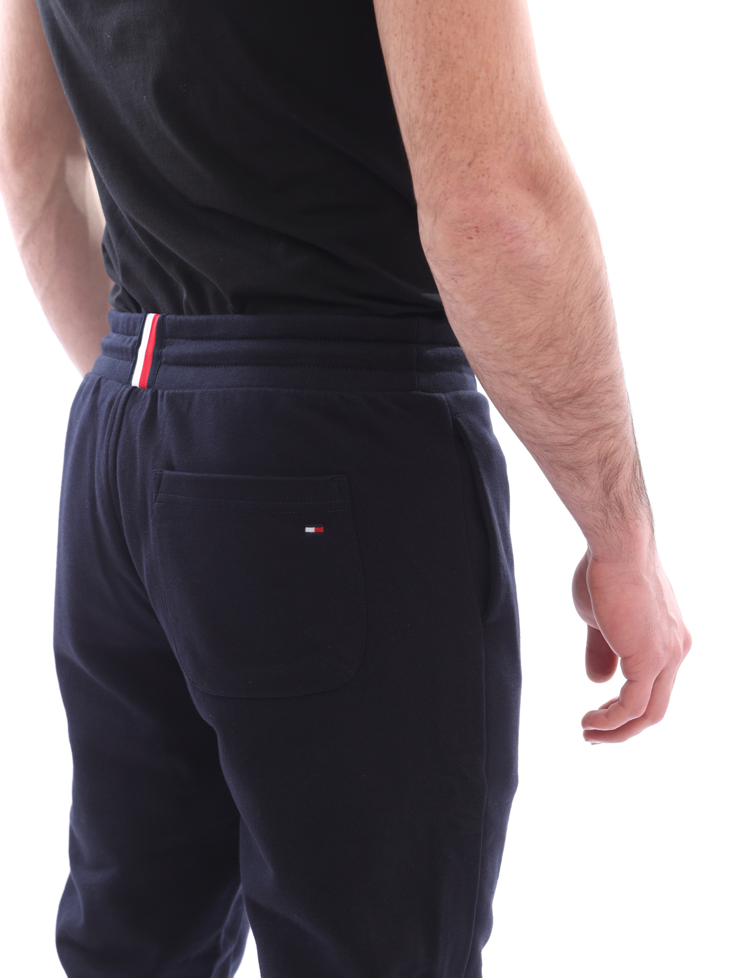 Брюки темно-синие хлопковые зауженного кроя с крупным логотипом сбоку — купить в интернет-магазине Verdistore