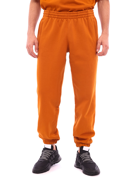 картинка Брюки Adidas H11383 оранжевые хлопковые с манжетами магазин Verdistore являющийся официальным дистрибьютором в России 