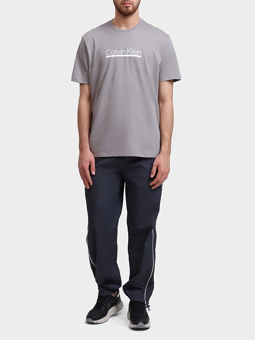 Брюки Calvin Klein Jeans LV04RC522G 4XN черные мужские с логотипом на боку — купить в интернет-магазине Verdistore