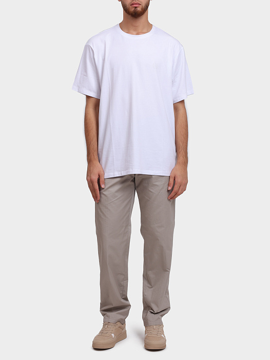 Брюки Armani Exchange XM000360 AF12307 U6154 бежевые мужские из хлопка — купить в интернет-магазине Verdistore